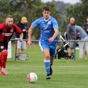 Wells Town in action against Wymondham Town