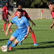 Callum Brain in action for Wells Town against Wymondham