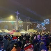 People gathered in Fakenham's Market Place to witness the Christmas light switch-on event take place