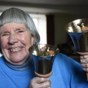 Coastal Handbells founder Suzanne Rands, with the newly refurbished instruments which she has helped bring back to playing standard