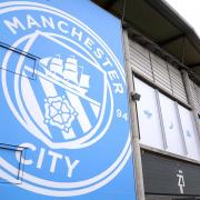 General view from outside the stadium of the Manchester City crest before the UEFA Champions League quarter final first leg match at Etihad Stadium, Manchester. Picture date: Tuesday April 11, 2023.