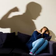 A woman in Norfolk was forced to live with her abusive partner for seven months due to a council's failure to adequately address her housing needs