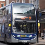 Officials at Norfolk County Council are to draw up a report into the possibility of the council taking control of bus services. Inset: Councillors Graham Plant and Rob Colwell