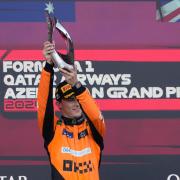 Oscar Piastri celebrates his win (AP Photo/Sergei Grits)