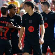 Barcelona’s Lamine Yamal, second left, celebrates his opening goal against Girona (Joan Monfort/AP)